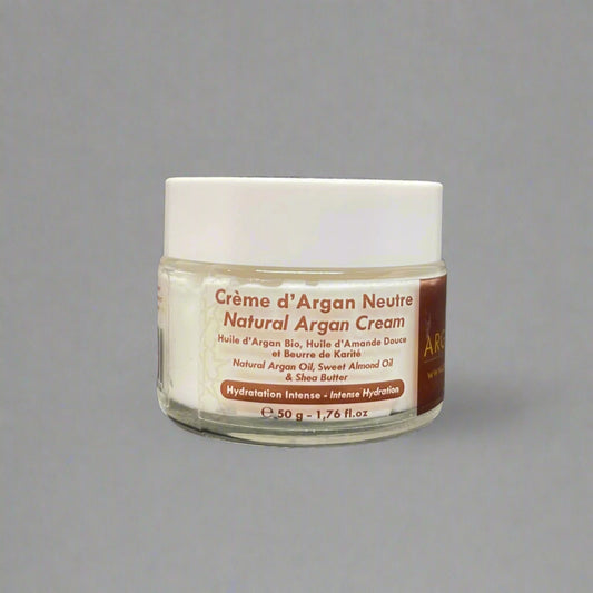 A jar of ARGALISTA Natural Argan Cream with the label detailing the product as 'Creme d'Argan Neutre' and listing ingredients such as natural argan oil and shea butter.